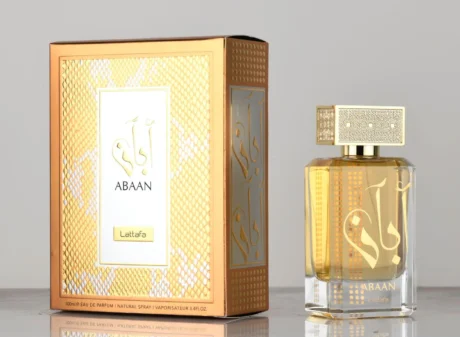 Lattafa Abaan 100ML perfume bottle with a sleek and elegant design. Luxurious Lattafa Abaan fragrance on a wooden background. Lattafa Abaan – Sophisticated men's perfume in a stylish bottle