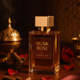 A premium Arabian luxury flatlay featuring the “Musk Rose by Arabian Oud” perfume bottle